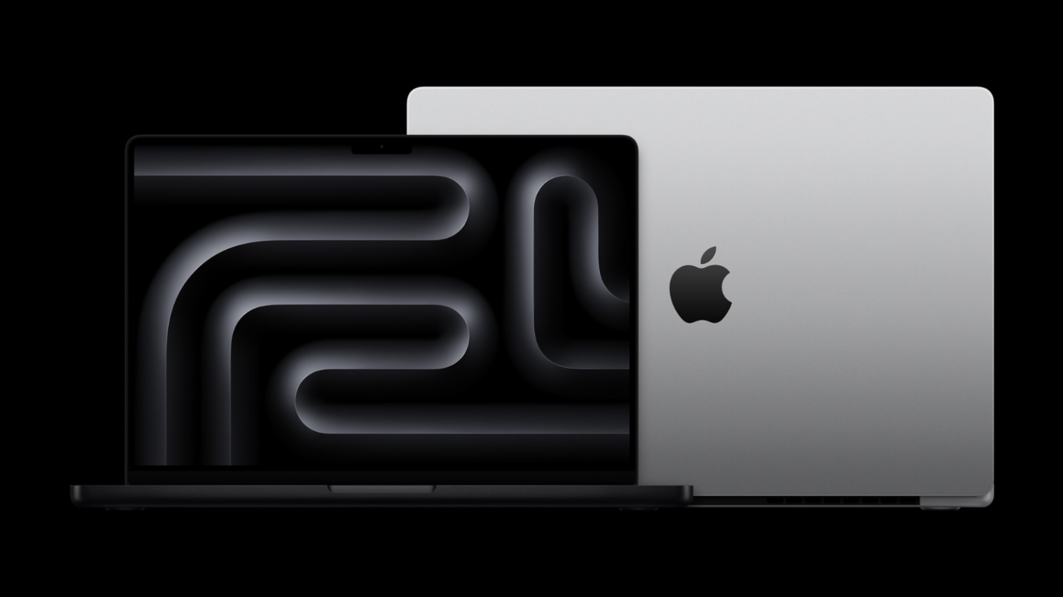 the 14- and 16-inch m4 apple macbooks pros against a black background