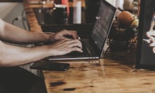 Person typing on the computer.