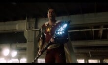 Shazam holds a magical staff