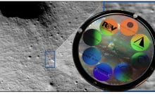 The moon, zoomed in on a landing site, with a disk covered in smaller colorful disks