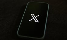 X logo on mobile device