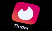 tinder logo displayed on smart phone