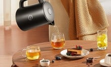 smart tea kettle pours tea 