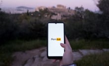 The Pornhub logo is being displayed on a smartphone screen