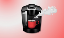 Keurig K-Classic coffee maker with red cup and illustrated steam 