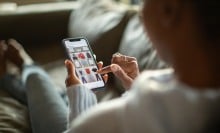 Woman purchasing clothes on a mobile app