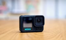 gopro hero 13 black action camera on wood tabletop