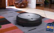 roomba i3 evo cleaning area rug, badge over image reads 'Prime Big Deal Days'