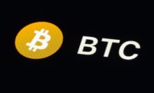 bitcoin logo on black background