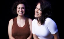 Abbi Jacobson and Ilana Glazer smiling in a portrait. 