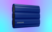 Samsung T7 Shield 2 TB on a blue/purple gradient background