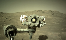 The Perseverance rover peering onto the Martian landscape.