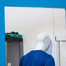 The back of a mannequin's head in a storage closet at CES