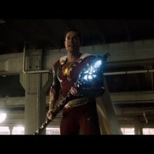 Shazam holds a magical staff