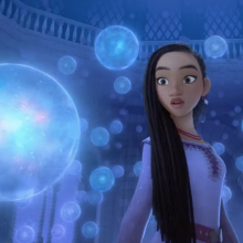 A screenshot from Disney's "Wish" trailer, showing Asha surrounded by bubbles of wishes.