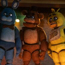 Five Nights At Freddy's characters on stage. 