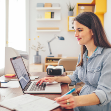 woman working on laptop at home