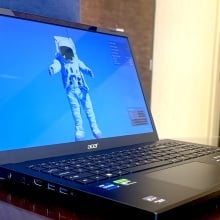 Aspire 3D 15 SpatialLabs laptop on a table with astronaut on the display