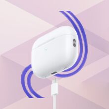 usb-c apple airpods with charging cable on design background