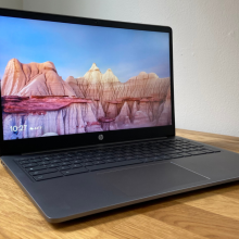 hp chromebook plus 15.6-inch on a wooden surface