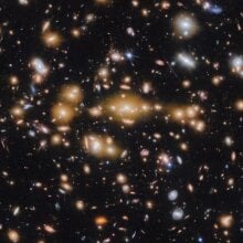 A spectacular view of galaxies captured by the James Webb Space Telescope in deep space, billions of light-years away.