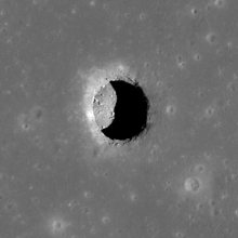 A pit, leading to a cave, in the Mare Tranquillitatis region of the moon.