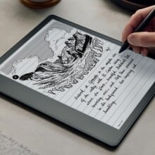 A person takes notes on the Kindle Scribe