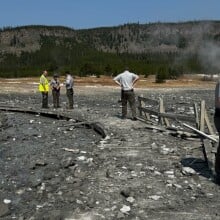 Park rangers assessing damage from the hydrothermal explosion in Yellowstone National Park.