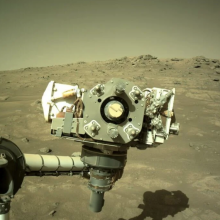 The Perseverance rover peering onto the Martian landscape.