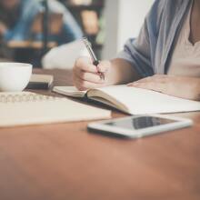 Girl writing notes