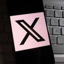 X logo on mobile device