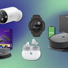 TP-Link security camera, Roku Ultra, Garmin Instinct watch, Beats Studio Buds, and Roomba i3+ with blue and green background