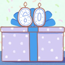 gift-shaped cake with 60 on top