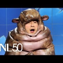 Bowen Yang as baby hippo Moo Deng in a segment on SNL's weekend update