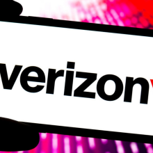 In this photo illustration, a Verizon logo is displayed on the screen of a smartphone.