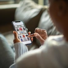 Woman purchasing clothes on a mobile app