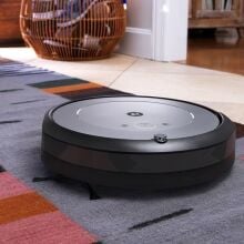 roomba i3 evo cleaning area rug, badge over image reads 'Prime Big Deal Days'