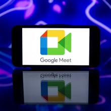 Google Meet logo on a mobile phone.