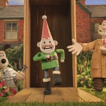 Wallace and Gromit unbox a garden gnome.