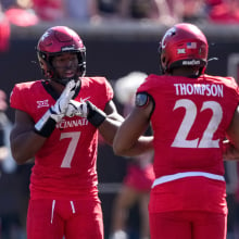 Jared Bartlett #7 and Jonathan Thompson #22 of the Cincinnati Bearcats