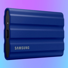 Samsung T7 Shield 2 TB on a blue/purple gradient background