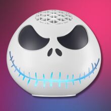 5th gen echo dot with a shell of Jack Skellington's head on a pink and black background