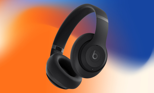 Beats Studio Pro on an orange, white and blue watercolor background