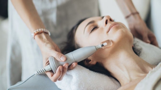 Person in a spa having a facial.