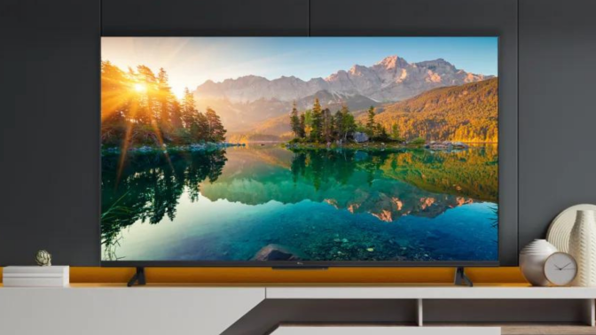 TCL TV on TV stand with nature screensaver