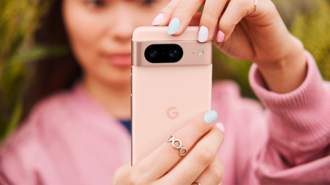 a close-up of a woman taking a photo with a google pixel 8