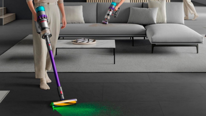 woman vacuuming floors with Dyson Gen5detect Absolute cordless vacuum