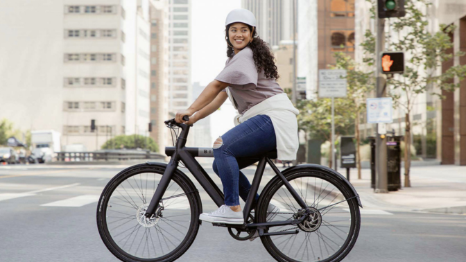 Smiling woman on ebike.