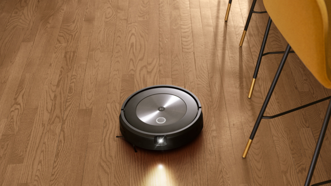 iRobot Roomba j7 with headlight cleaning hardwood floor