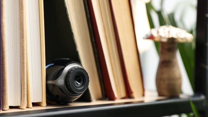 Indoor security camera hiding inside a bookshelf